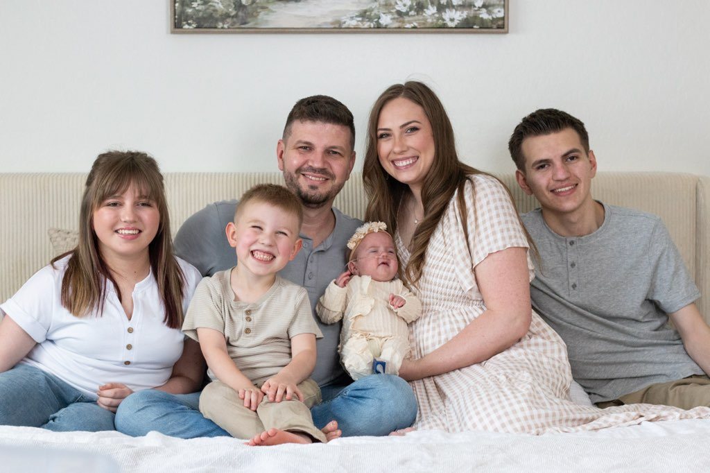 The Millet family — Mike, Emily, and their four kids